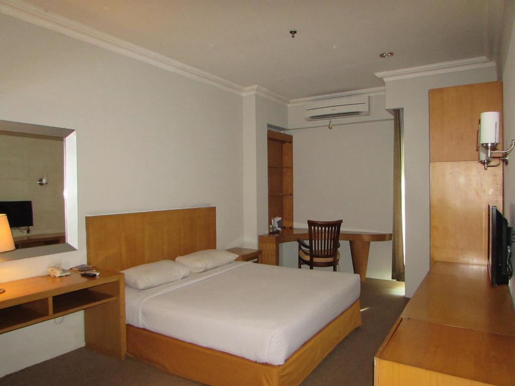 Hotel Wisata Палембанг Стая снимка