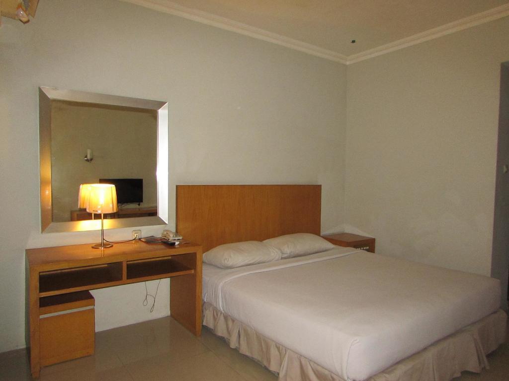 Hotel Wisata Палембанг Стая снимка